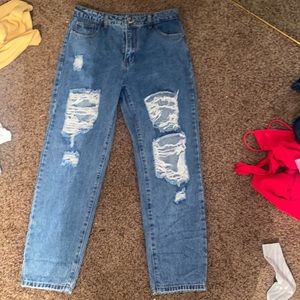 Med wash ripped straight leg ripped jeans never worn